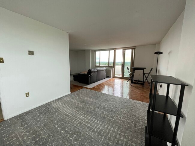 Dining and Couch Area - 1 E University Pky