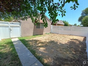 Building Photo - 7046 Enfield Ave