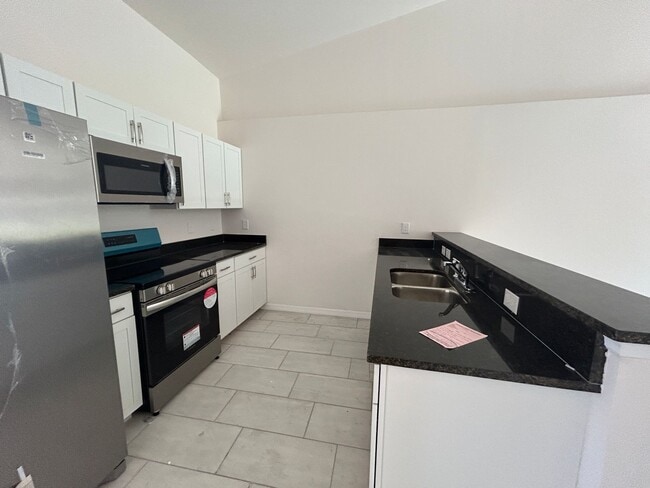 Building Photo - Coming Soon  Newer  3/2 Duplex -1 car garage