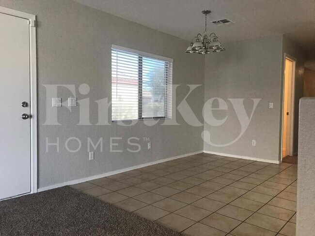 Building Photo - 8334 W Hughes Dr