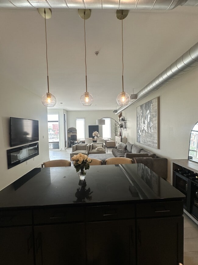 Open kitchen, living, and dining area - 119 4th St