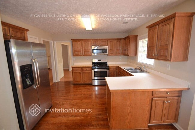 Foto del edificio - 5684 Dexter's Mill Pl