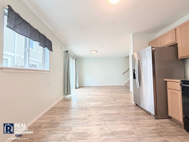Building Photo - Spacious 4-Bedroom Townhome in Alicia Meadows | Garage, Patio & Pet Friendly