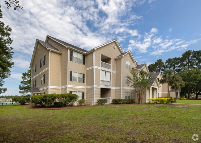 Building Photo - The Retreat at Grande Lake Apartments