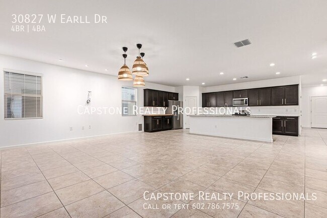 Foto del edificio - Uncover Your Ideal Residence: A 4-Bedroom ...