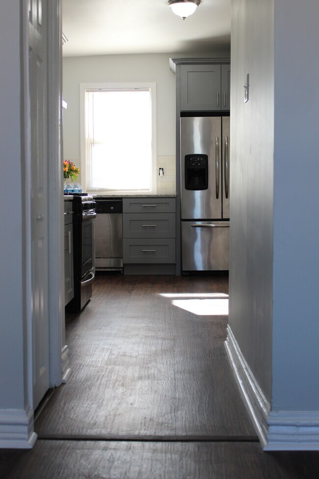 View of kitchen from living room - 241 68TH ST