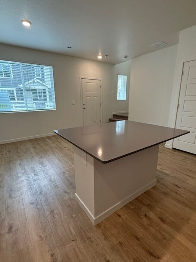 Building Photo - New 2 Bedroom Townhome + 2 Car Garage