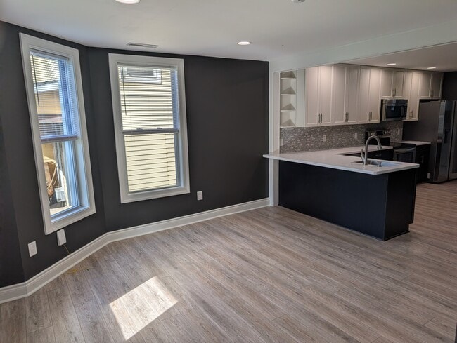 Living room into kitchen - 307 Fairview Ave