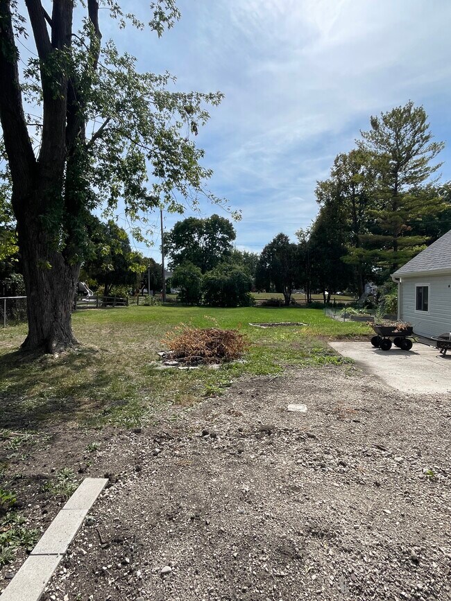 Back yard with city park behind - 116 8th St