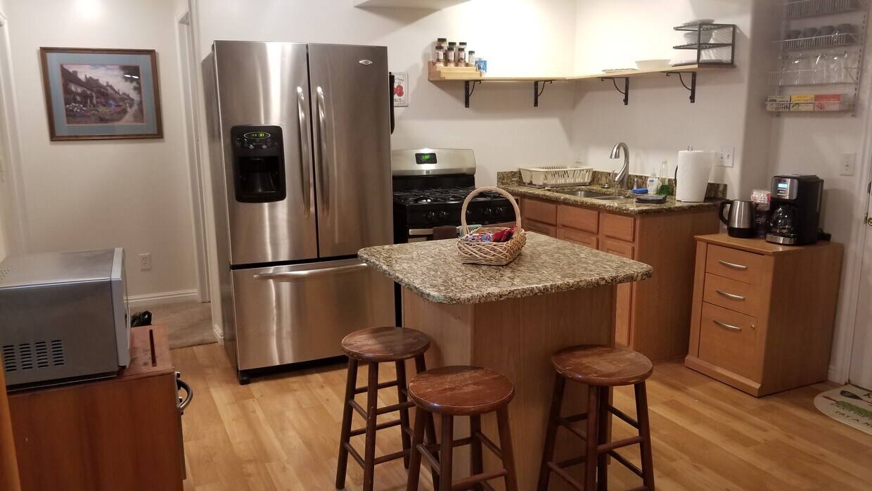Kitchen with gas stove. - 6738 S Morro Street