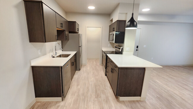 1x1: D-201 Cocina y despensa - The Vicara Apartments & Townhomes