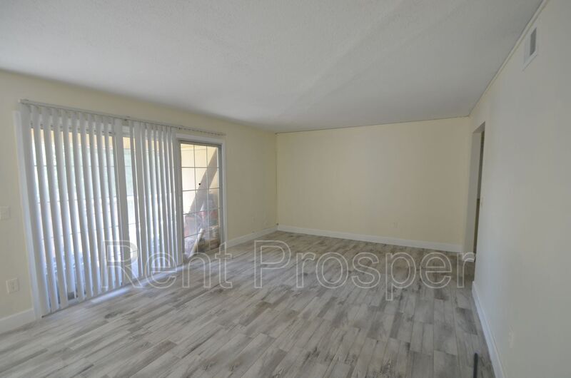 4182 Versailles Dr Unit D, Orlando, FL 32808 Condo for Rent in