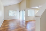 This 920 square foot townhome in San Diego's LaCosta community offers a blend of comfort and functionality across two floors. The ground floor, spanning 730 square feet, houses the main living areas. A modern kitchen boasts white cabinetry, stainless steel appliances, and granite countertops, opening to a combined living and dining space. Large windows and sliding glass doors flood the area with natural light, while warm wood flooring adds a touch of elegance throughout.

Upstairs, 190 square feet accommodate three bedrooms, including a spacious 130 square foot primary bedroom. All bedrooms feature ample closet space and continue the wood flooring theme. Two well-appointed bathrooms, one on each floor, offer convenience and privacy.

The home's design maximizes space efficiency, with a staircase and hallway connecting all areas seamlessly. Vaulted ceilings in some rooms create an airy atmosphere, enhancing the sense of spaciousness. The property's location at 4342 West Point Loma Boulevard places residents in the heart of San Diego, offering both urban convenience and coastal proximity.