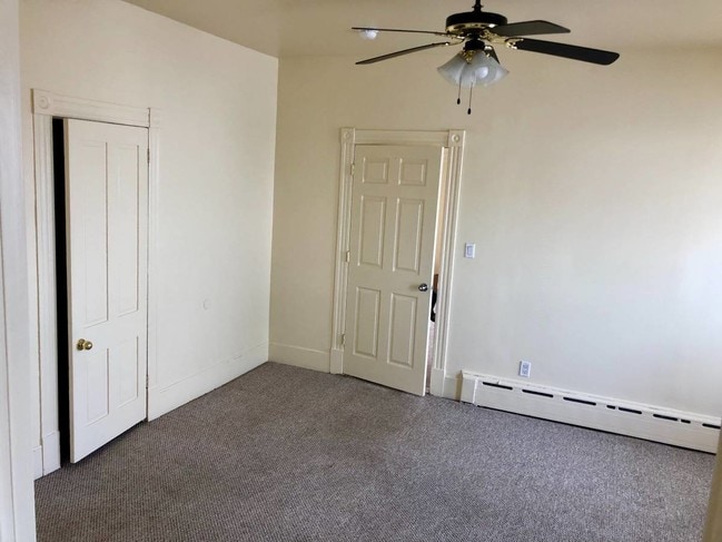 features ceiling fan and plenty of storage - 224 E Main St