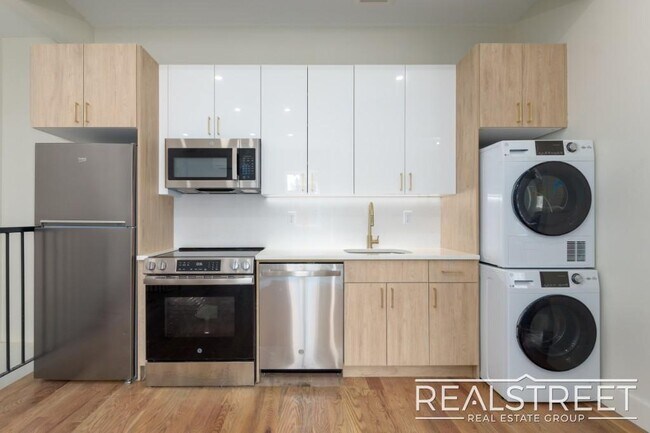 Building Photo - Modern Two-Bedroom Duplex in Prime Clinton Hill – One Block from Pratt University