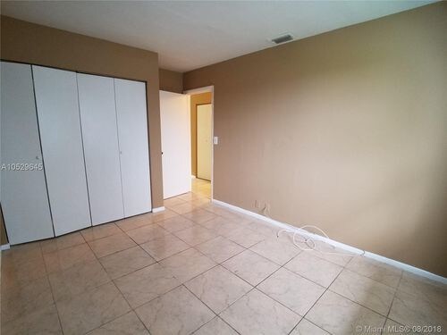 Building Photo - 10624 Royal Palm Blvd