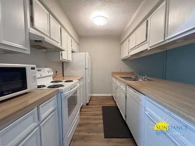 Foto del edificio - Charming 2 Bedroom Townhouse, great fenced...