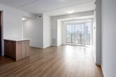 Located on the 16th floor at 49 Walnut St S in downtown Hamilton, this modern 3-bedroom, 2-bathroom unit offers a bright and efficiently designed single-level layout. The open-concept kitchen and living area serves as the heart of the home, featuring light hardwood-style flooring, flush ceiling lighting, and a seamless flow between spaces. The kitchen is well-appointed with white upper cabinetry, warm wood lower cabinets, a subway tile backsplash, stainless steel appliances including a range, microwave, and dishwasher, and a sleek quartz peninsula ideal for casual dining or meal prep. The living area opens directly onto a private balcony through sliding glass doors, offering sweeping views of the Hamilton cityscape and surrounding greenery. Each of the three bedrooms is finished with the same light flooring and crisp white walls, with large floor-to-ceiling windows that frame expansive city and treetop views, filling the rooms with abundant natural light. The primary bedroom provides a comfortable and well-proportioned retreat. The two bathrooms are finished in a clean, contemporary style — one featuring a glass-enclosed stand-up shower with a wood-toned vanity and framed mirror, and the other with a full soaker tub. A functional hallway connects all rooms efficiently throughout the unit.