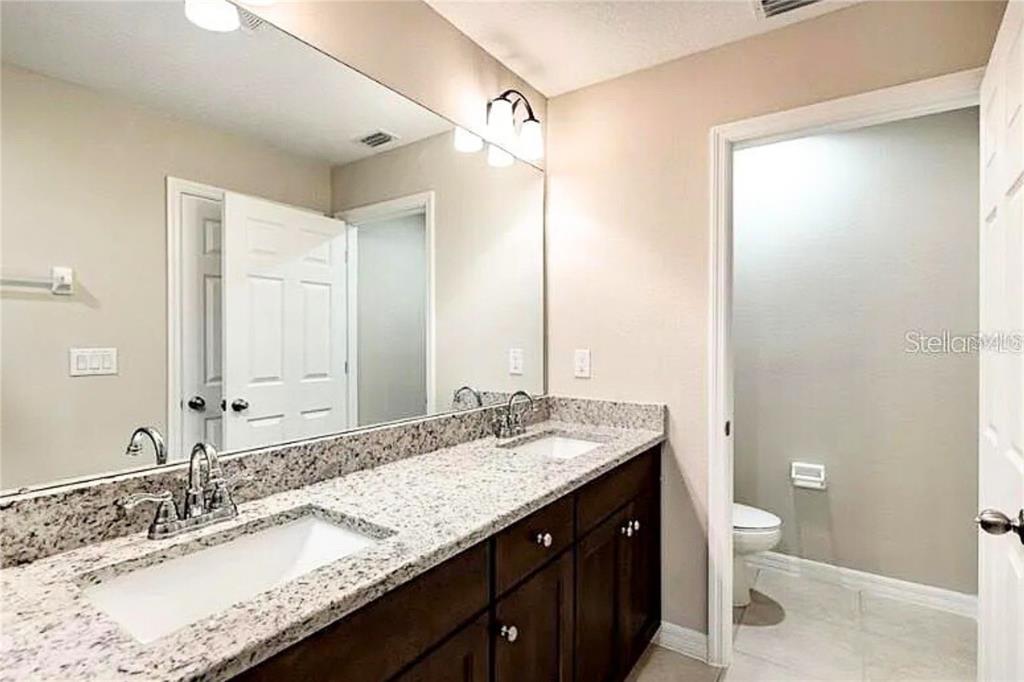 Building Photo - 6320 Tillandsia Pl