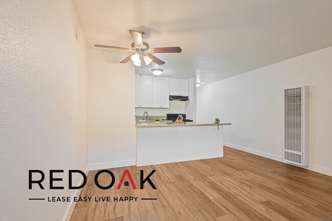 Building Photo - Lovely, Sun-Drenched Studio Featuring Hard...