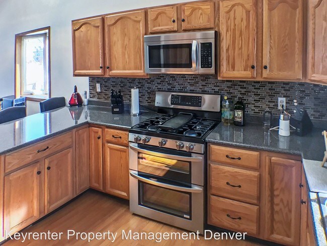 Building Photo - 4 br, 2 bath House - 7065 W Kentucky Ave