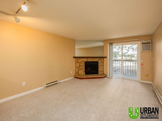 Foto del edificio - Comfortable 1-Bedroom Condo with Parking & Resort-Style Amenities