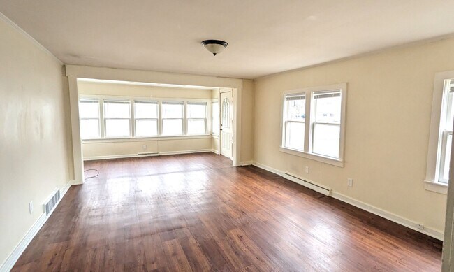 Building Photo - 1343 E. Broadway. House with basement and ...