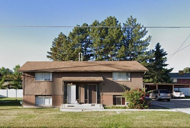 Building Photo - 3359 W. &amp; 3369 W. 4100 S. WVC - DUPLEX