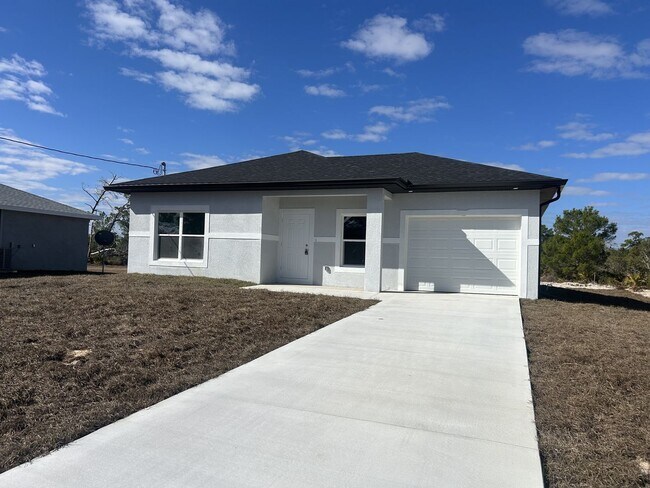 Building Photo - Brand-New Modern 2BR/2BA Home with Garage- In Serene Lake Placid Location