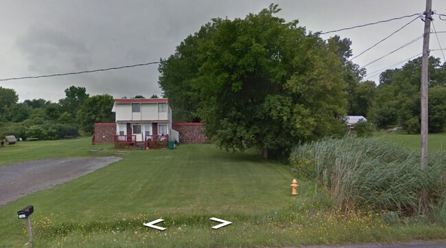 Large front and back yards. - 4104 Main St