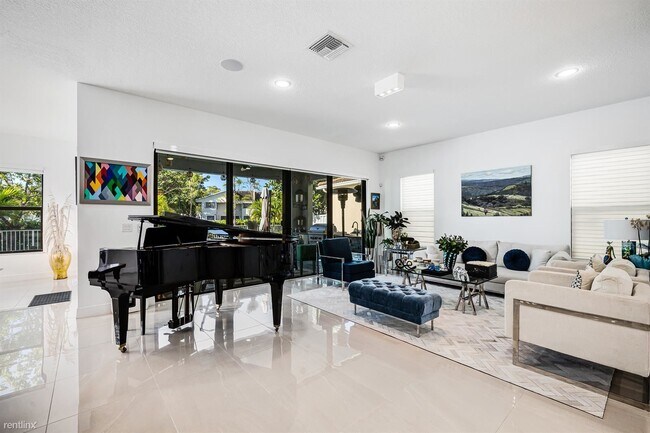 Foto del edificio - 4 br, 2.5 bath House - 9044 NW 39th St