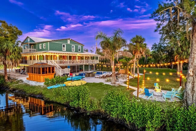 Building Photo - #1 Largest Tampa Private Compound  11BR Sl...