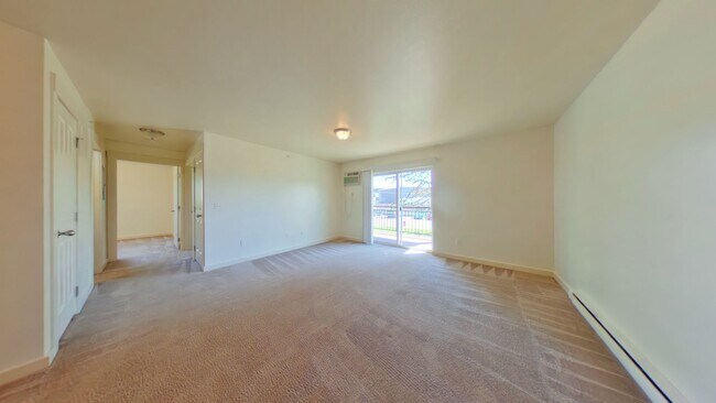 Building Photo - Centrally Located Second Floor 2b w/ Private Deck! Close to MSU & Downtown