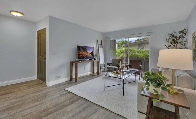 Building Photo - Turnkey ground floor condo in the coveted ...