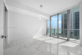 Building Photo - 17475 Collins Ave