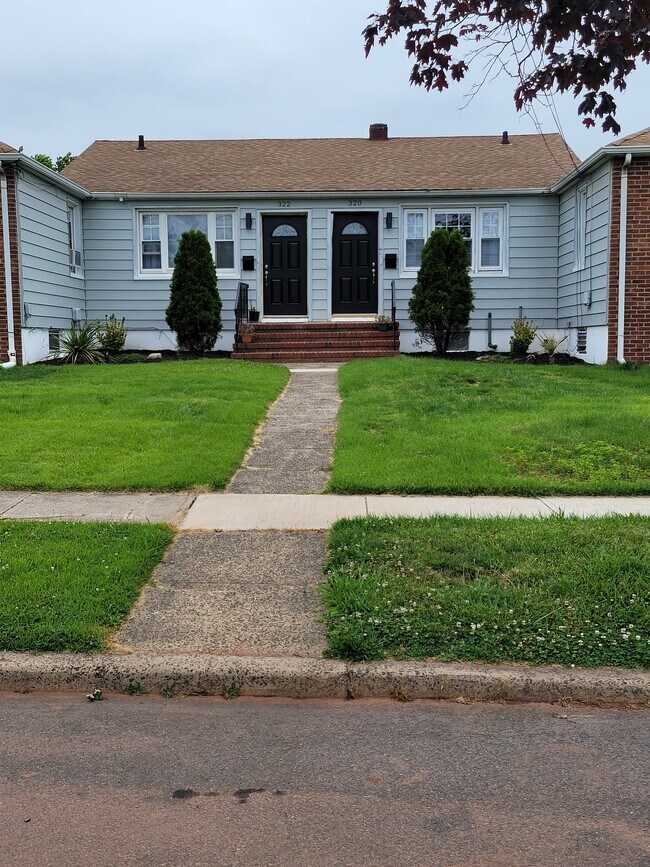 Front View - 320 W 12th St