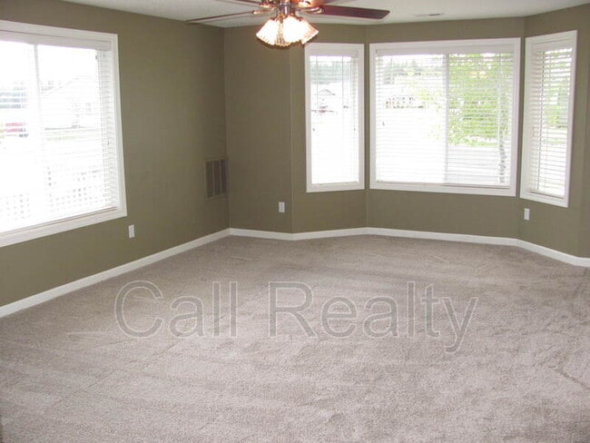 Building Photo - 9302 W Caelen Ave