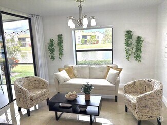 Building Photo - 8625 Boca Glades Blvd W