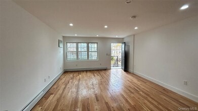 Building Photo - 69-31 Burchell Ave