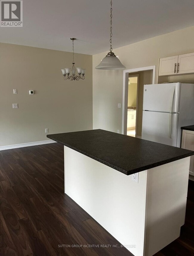 Photo du bâtiment - 1801 River Rd W