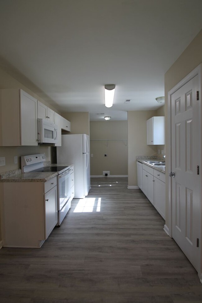 Building Photo - Exclusively Offered by Muse Realty Rentals...