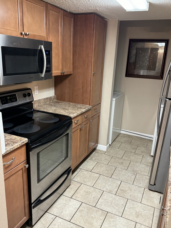 Kitchen with stainless appliance, dishwasher - 20 Carriage Crossing Ln