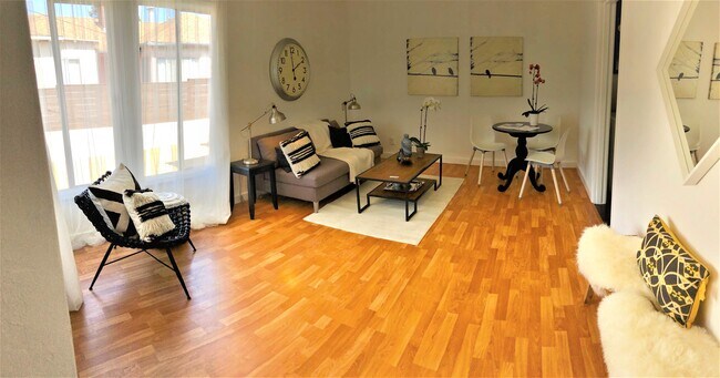 Living Room. Note: Unit is staged in photos; unit is not furnished. - 1397 Curtis St