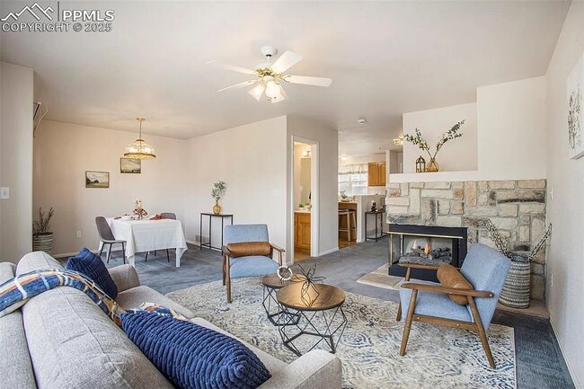 Living and Dining Rooms w/ gas fireplace - 3272 Capstan Way Apartment