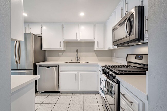 Kitchen with Stainless Steel Appliances - 6323 Reseda Blvd