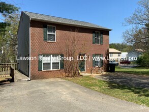 Building Photo - 5506-5508 Woodland Ln