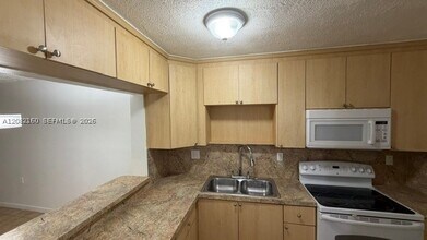 Building Photo - 6070 W 18th Ave