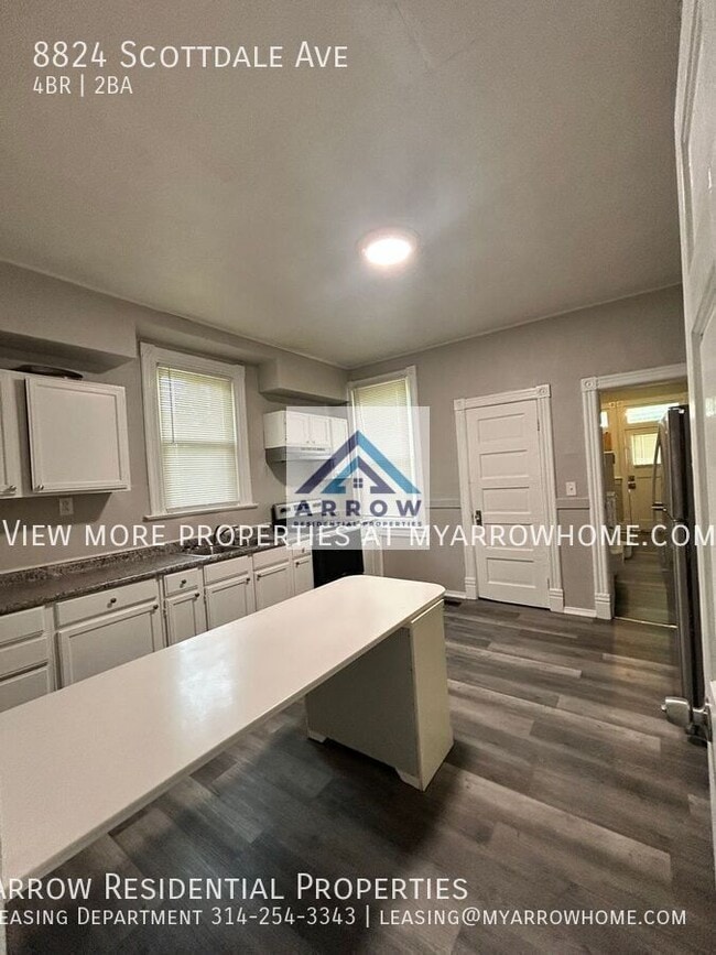 Building Photo - 8824 Scottdale Ave