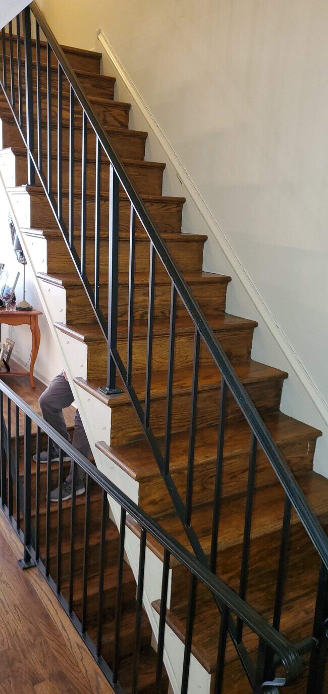 Dramatic wood stairs and custom railings - 20 Sutphin