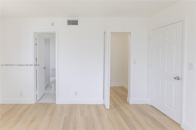 Building Photo - $2,100MONTHLY;8740 N SHERMAN CIR. #408 MIR...